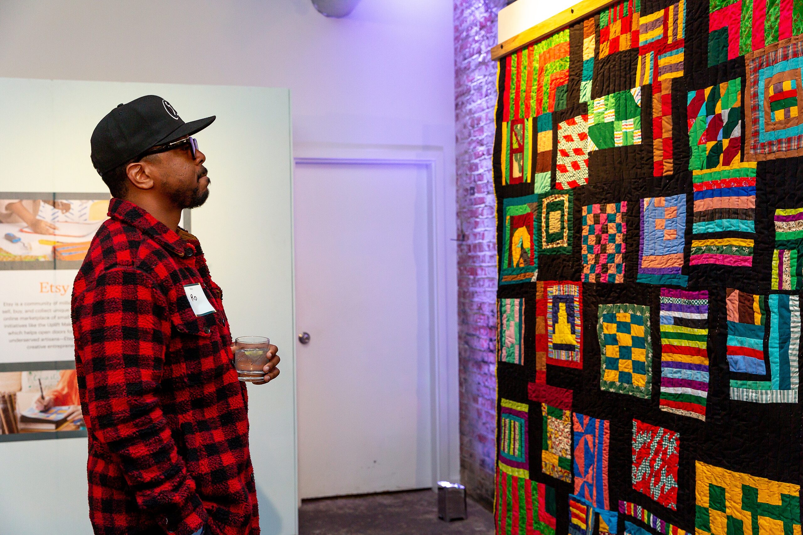 guest views quilt at Etsy Event in DC