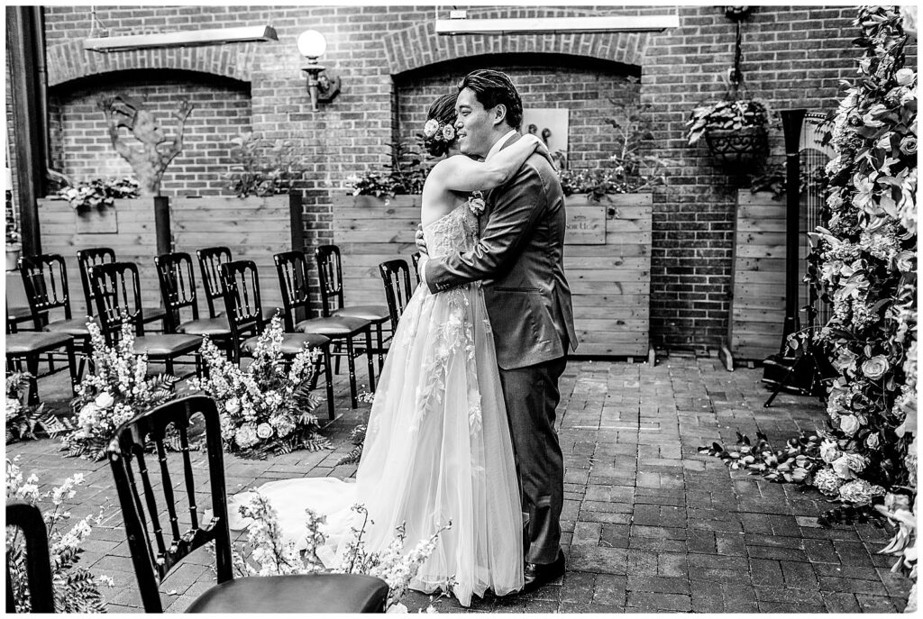 Bride and Groom Hugging during their Wedding Day First Look