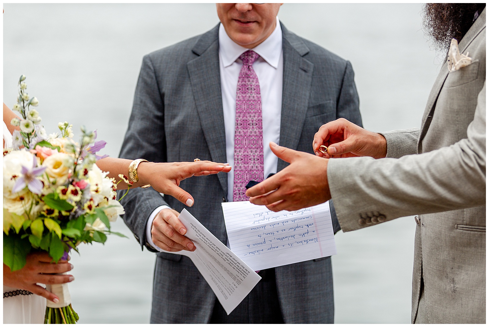 close up of wedding ceremony exchanging of rings