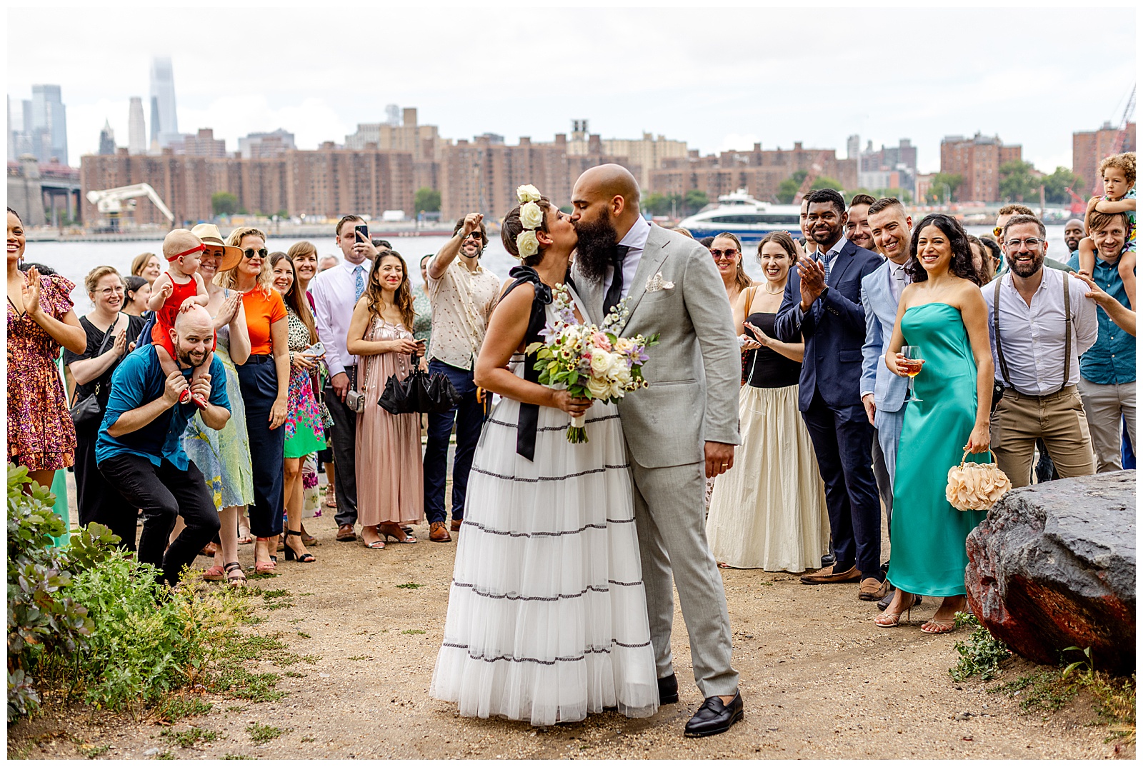 wedding kiss in Brooklyn New York by water