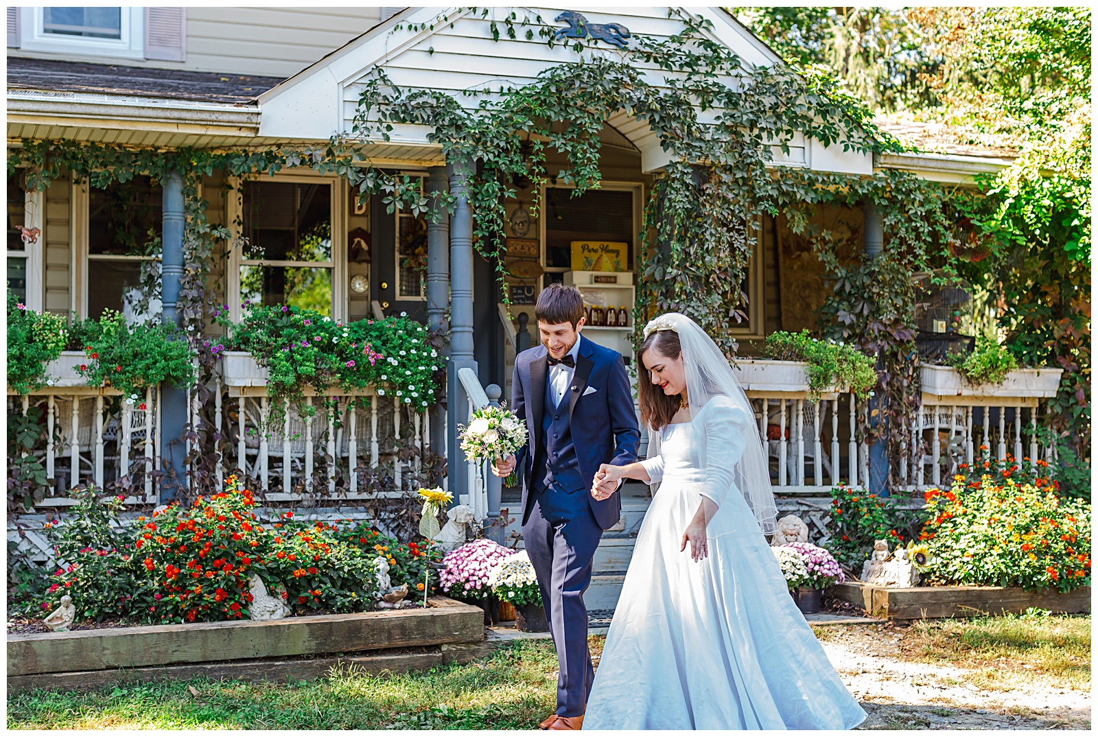 candid portrait of bride and groom walking during photo session