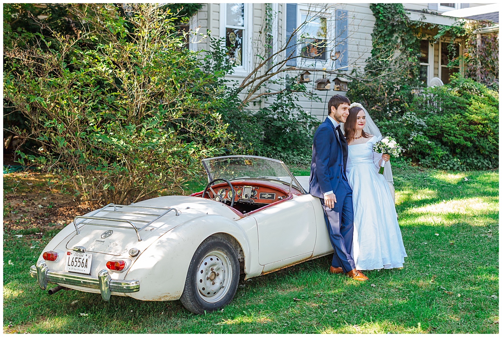 candid couple smiles for portraits during their fall wedding at Fairwinds Farm