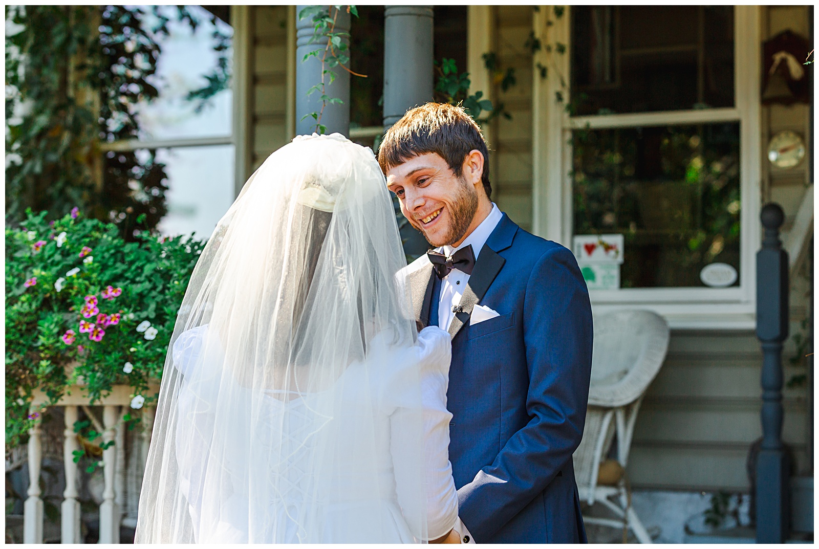 groom smiles at bride during first look on wedding day at Romantic Autumn Wedding at Fairwinds