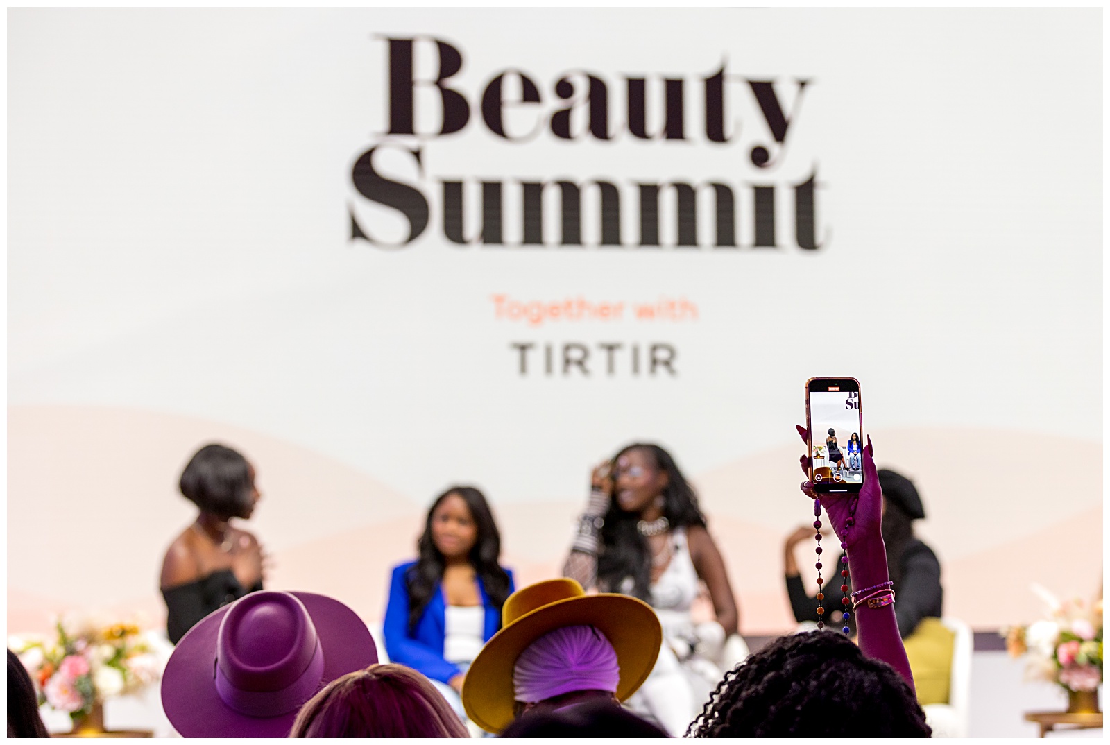 attendees captured content on their phones for the duration of the panels at the BBR Summit coverage by editorial event photographer