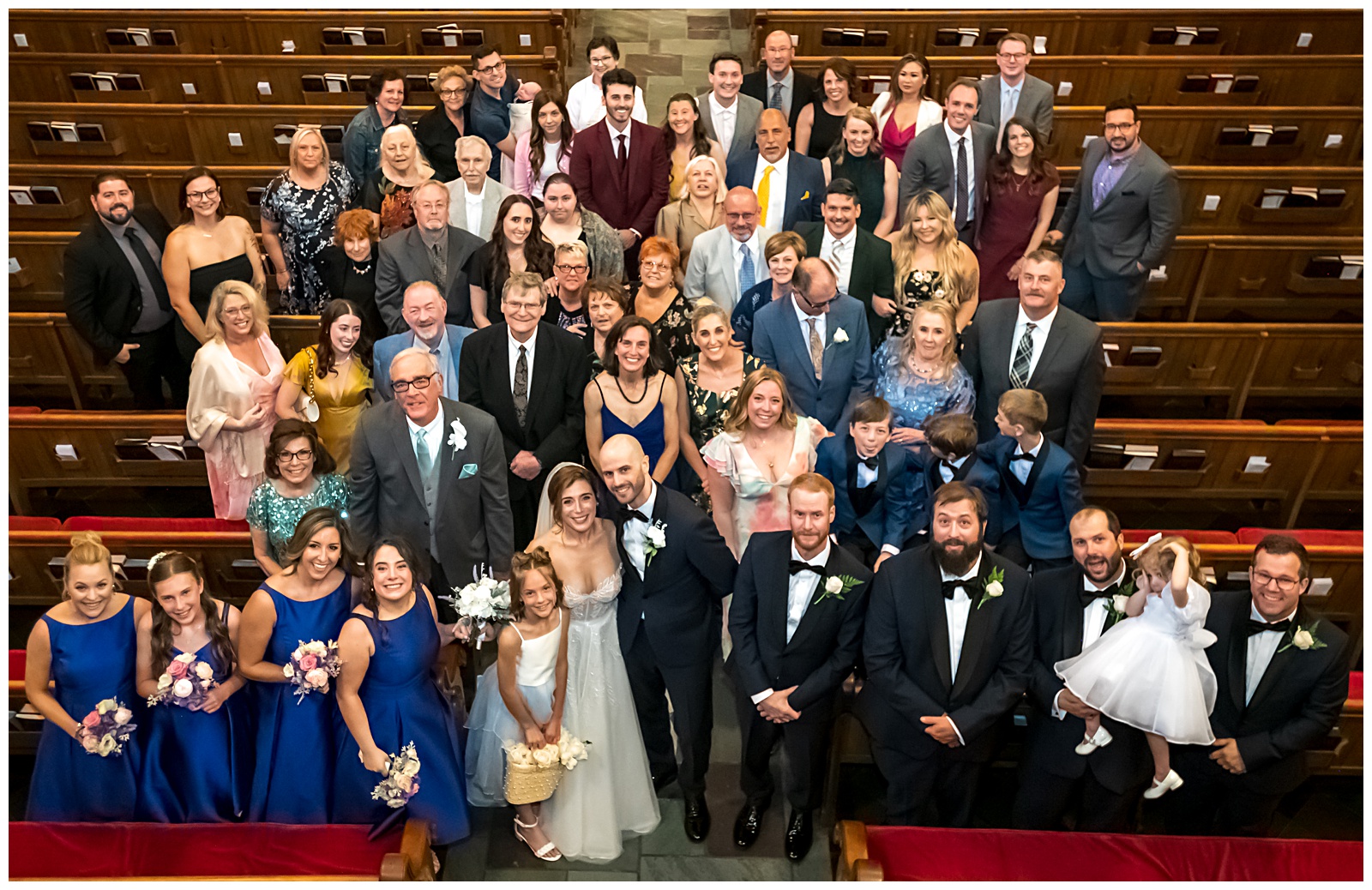 Large family portrait inside church after DC wedding ceremony