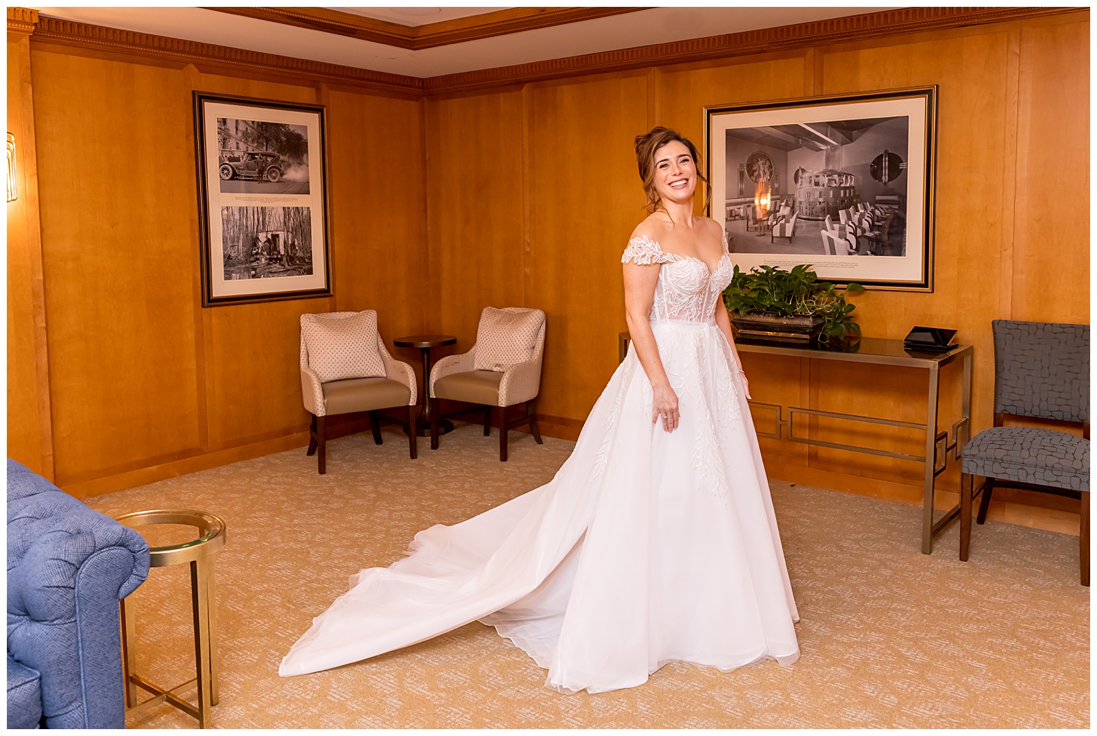 Bride laughing while preparing in hotel suite at Omni Shoreham DC