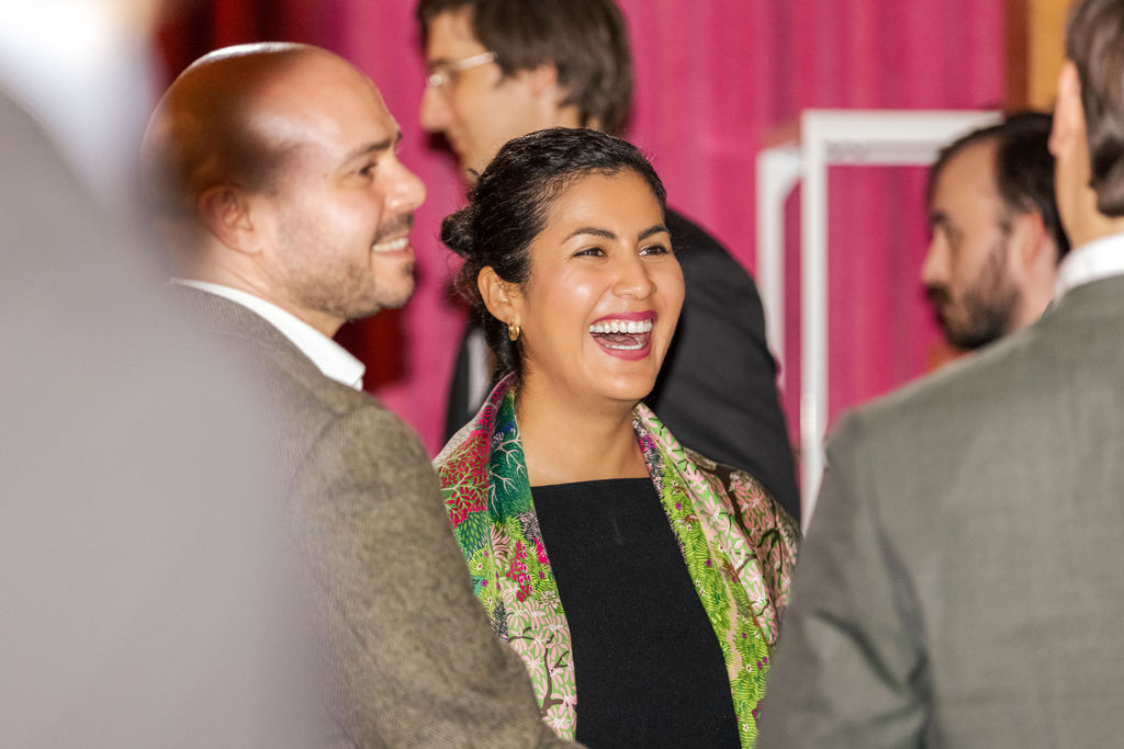 A guest smiling during cocktail hour