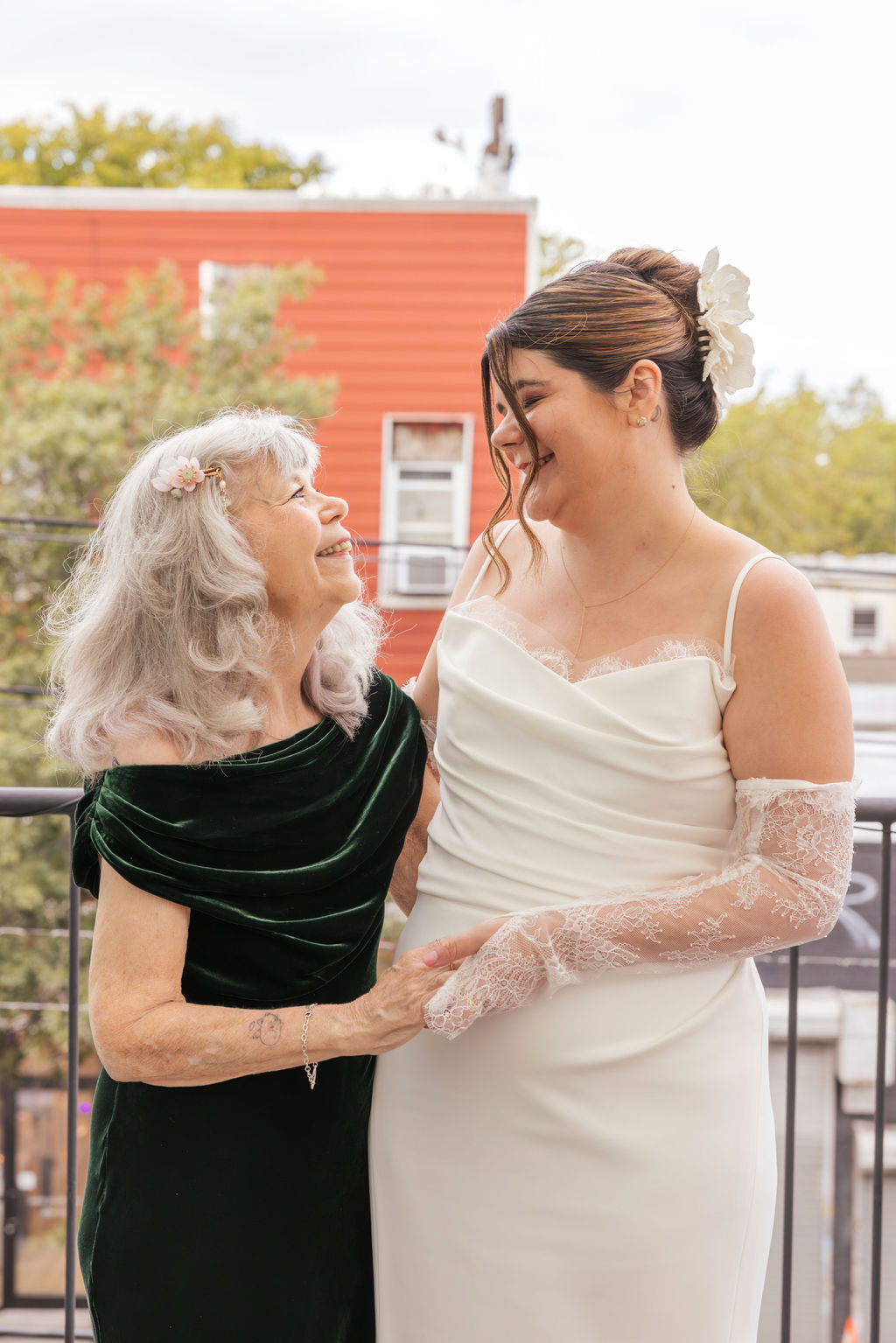 Bride sharing a quiet moment with a family member during a Brooklyn brewery wedding.