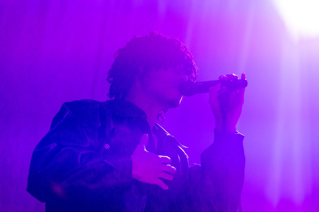 Editorial concert photography artist spotlight featuring 070 Shake at the 9:30 Club, blending hip hop grit with dramatic lighting and emotional depth.