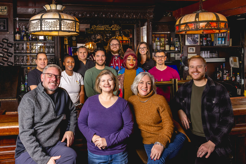 staff group portrait inside restaurant showcasing team culture and hospitality branding