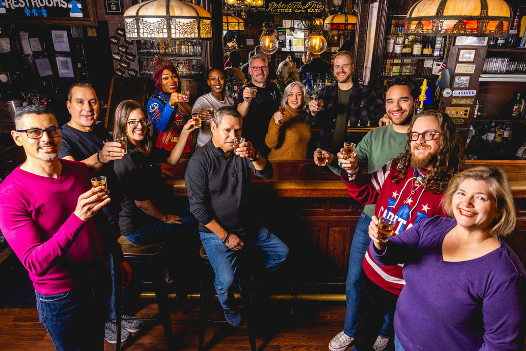 restaurant team toast inside capitol hill bar for commercial branding photography