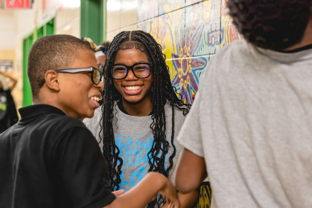 students having a laughing moment during their afterschool program