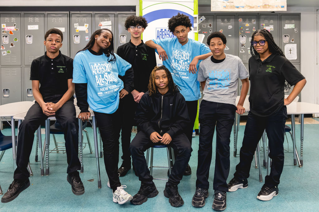 Documentary school photography group portrait of students at P.S. 272 Curtis Estabrook after-school program in NYC