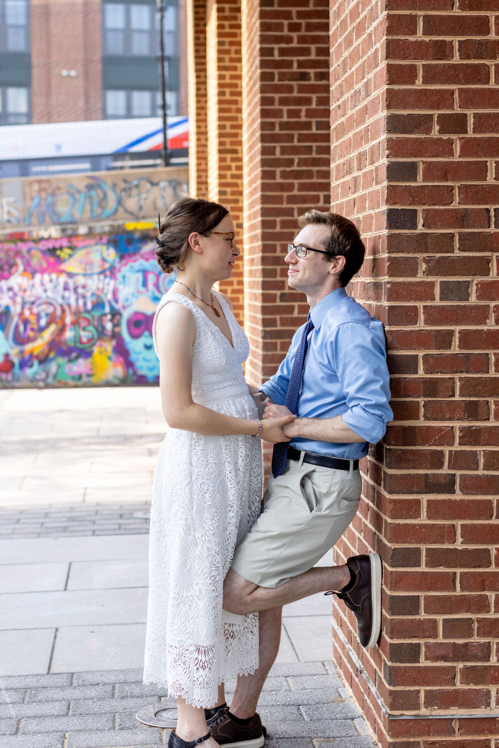 Couple portraits outside creative wedding venue called the Edgewood Arts Center 