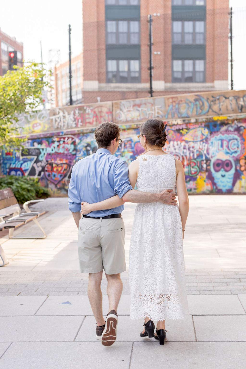 Small wedding ideas with colorful murals and candid wedding portraits in DC