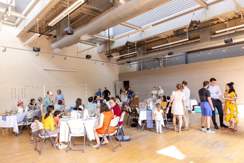 Guests gathering for intimate wedding reception at local arts center in Washington DC